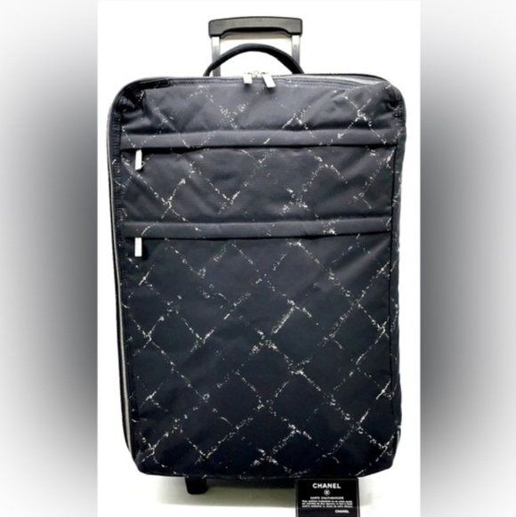 CHANEL Handbags - Chanel Black Travel Line quilted nylon rolling Carry On Suitcase